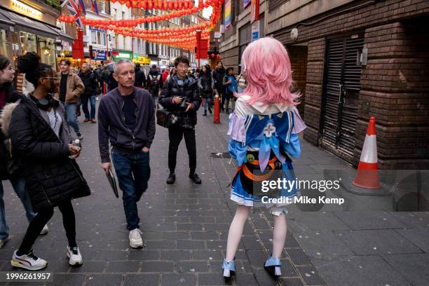 Young womoan dressed up as an animated character as people gather to celebrate the Chinese New Year of the Dragon in Chinatown on 10th February 2024...