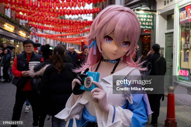 Young womoan dressed up as an animated character as people gather to celebrate the Chinese New Year of the Dragon in Chinatown on 10th February 2024...