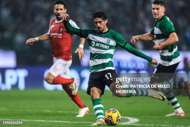 Sporting Lisbon's Portuguese forward Francisco Trincao kicks the ball and scores a goal during the Portuguese league football match between Sporting...