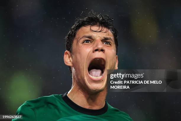 Sporting Lisbon's Portuguese defender Eduardo Quaresma celebrates after scoring his team's second goal during the Portuguese league football match...