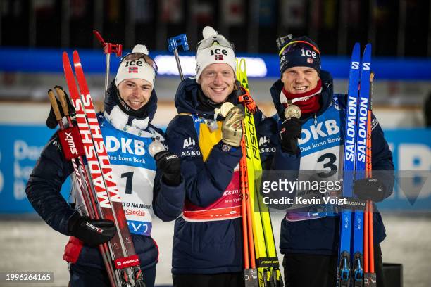 Second placed Sturla Holm Laegreid of Norway, first placed Johannes Thingnes Boe of Norway and third placed Vetle Sjaastad Christiansen of Norway...