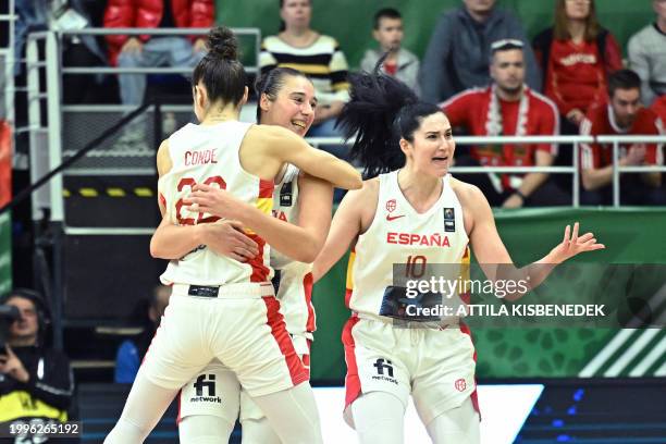 Spain's players celebrate their victory over Hungary after the 2024 FIBA Women's Olympic qualifying tournament basketball match between Spain and...