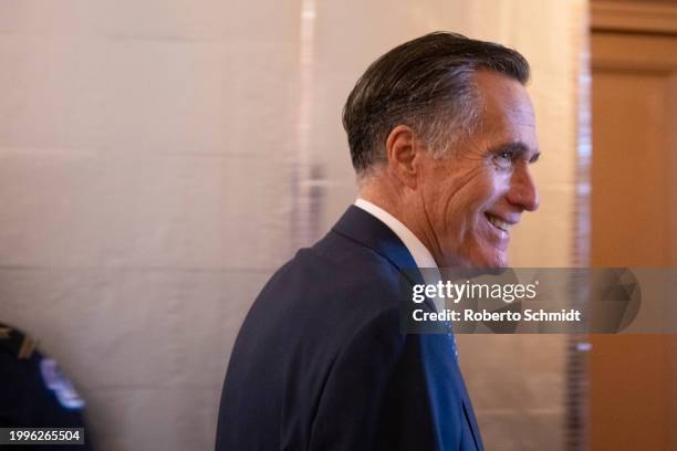 Sen. Mitt Romney leaves the Senate floor as the Senate worked through the weekend on a $95.3 billion foreign aid bill with assistance for Ukraine and...