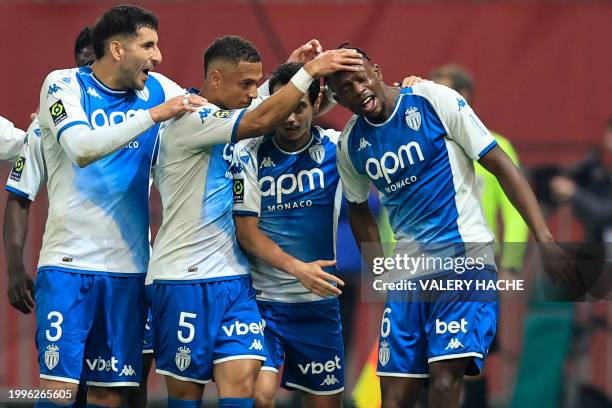 Monaco's Swiss midfielder Denis Zakaria celebrates with team mates after scoring a goal during the French L1 football match between OGC Nice and AS...