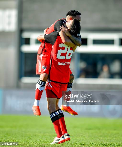 Ignacio Fernandez of River Plate celebrates with teammates after scoring the team's second goal during a Copa de la Liga 2024 group A match between...