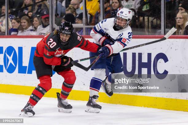 Forward Alex Carpenter passes the puck while being defended by Canada forward Sarah Nurse during the second period of the Canada USA Rivalry Series...