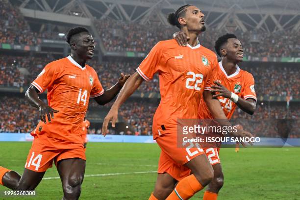 Ivory Coast's forward Sebastien Haller celebrates scoring his team's second goal during the Africa Cup of Nations 2024 final football match between...