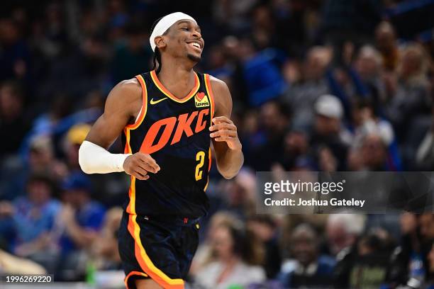 Shai Gilgeous-Alexander of the Oklahoma City Thunder smiles during the second half against the Sacramento Kings at Paycom Center on February 11, 2024...