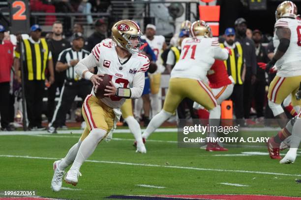 San Francisco 49ers' quarterback Brock Purdy looks to pass the ball during Super Bowl LVIII between the Kansas City Chiefs and the San Francisco...