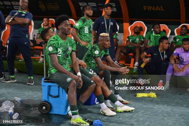 Nigeria players react after Ivory Coast won the Africa Cup of Nations 2024 final football match between Ivory Coast and Nigeria at Alassane Ouattara...