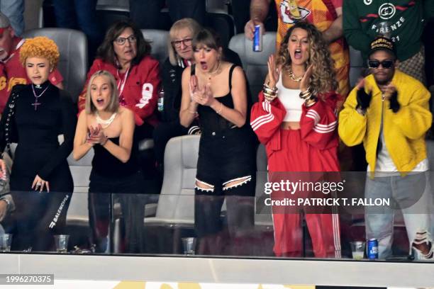 Singer-songwriter Taylor Swift , US rapper Ice Spice , Ashley Avignone and US actress Blake Lively attend Super Bowl LVIII between the Kansas City...
