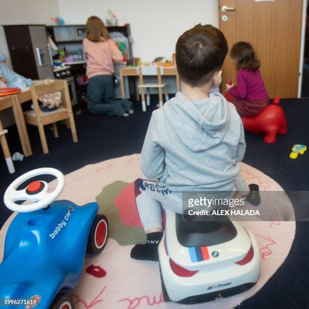 Children play in a room provided by the Matusya association which supports Ukrainian refugees in Vienna, Austria on February 8, 2024. Almost two...
