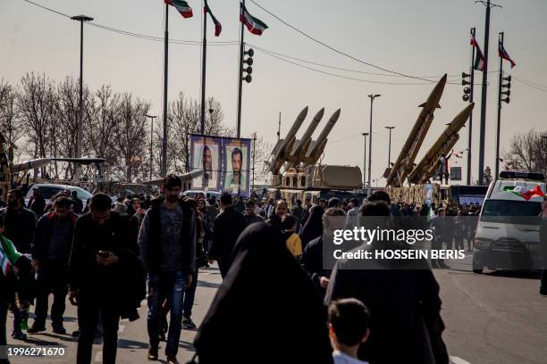 Missiles and UAV's are showed for the people on the side of the road in Tehran, Iran, on February 11, 2024.