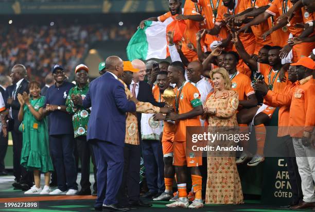 William Troost-Ekong of Ivory Coast holds the trophy at the end of the 2023 CAF Africa Cup of Nations Final match between Nigeria and Ivory Coast at...