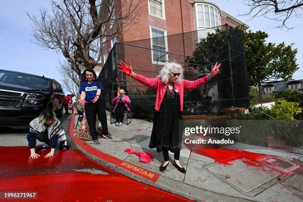 Group of Code Pink activists are gathered in front of U.S. Representative Nancy Pelosi's house calling for a ceasefire in the Israeli-Palestinian...