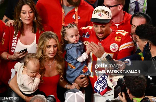 Kansas City Chiefs' quarterback Patrick Mahomes with his wife Brittany Mahomes and their children Patrick Bronze and Sterling Skye celebrate winning...