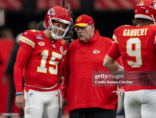 Kansas City Chiefs quarterback Patrick Mahomes talks with head coach Andy Reid before the start of Super Bowl LVIII on Sunday, Feb. 11 at Allegiant...