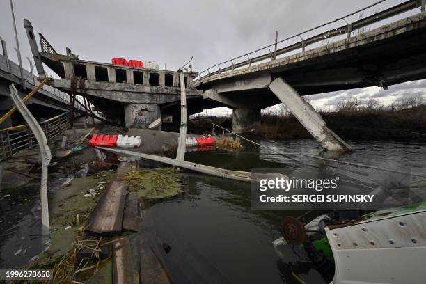 This photograph taken on February 8, 2024 shows a destroyed bridge in Irpin town, outside Kyiv, amid the Russian invasion of Ukraine.