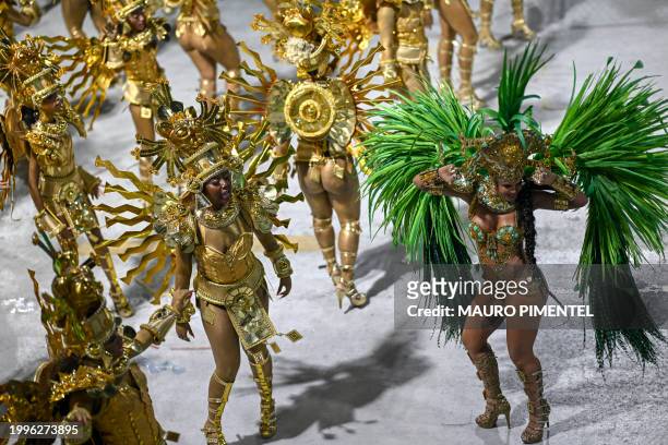Members of the Grande Rio samba school perform during the first night of the Carnival parade at the Marques de Sapucai Sambadrome in Rio de Janeiro...