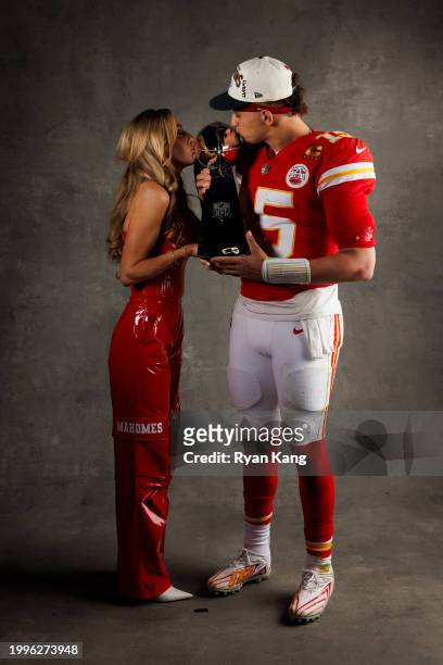 Patrick Mahomes of the Kansas City Chiefs and Brittany Mahomes pose for a portrait with the Vince Lombardi Trophy after Super Bowl LVIII against the...