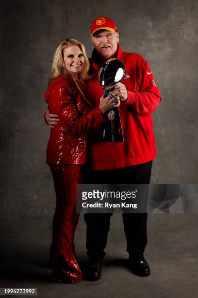 Head coach Andy Reid of the Kansas City Chiefs and Tammy Reid pose for a portrait with the Vince Lombardi Trophy after Super Bowl LVIII against the...