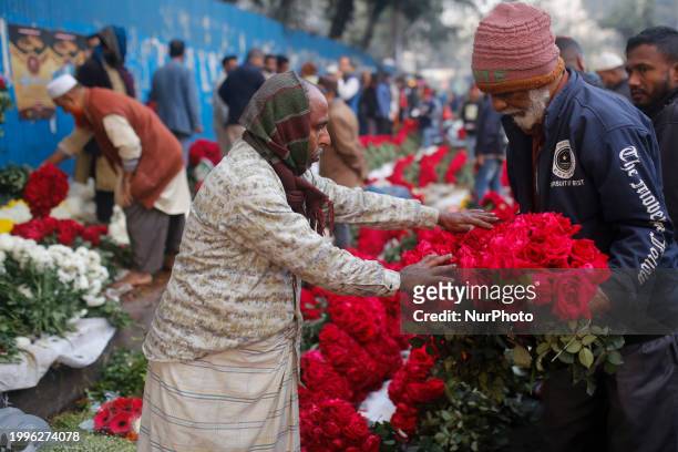Vendors are selling flowers at a wholesale flower market ahead of Valentine's Day in Dhaka, Bangladesh, on February 12, 2024.