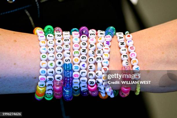 Academic Georgia Carroll wears Swiftie bracelets as she speaks to AFP during the Taylor Swift "Swiftposium" at the University of Melbourne, in...