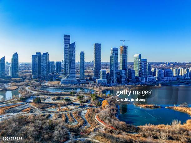 the view of humber bay shores skyline from waters of lake ontario, toronto, canada - toronto waterfront stock pictures, royalty-free photos & images