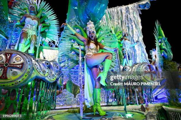 Members of the Unidos da Tijuca samba school perform during the first night of the Carnival parade at the Marques de Sapucai Sambadrome in Rio de...