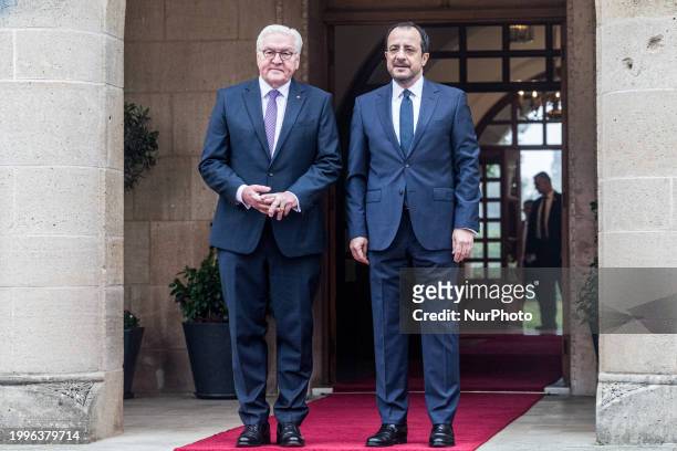 Nikos Christodoulides and Frank-Walter Steinmeier are standing in front of the Presidential Palace in Nicosia, Cyprus, on February 12, 2024. The...