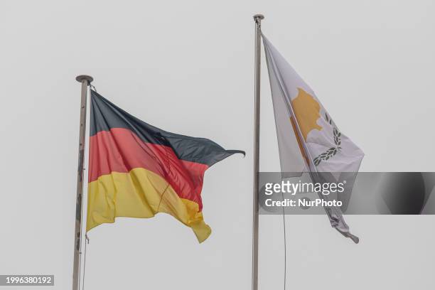 The flags of Germany and Cyprus are being displayed on the Presidential Palace in Nicosia, Cyprus, on February 12, 2024. President Frank-Walter...