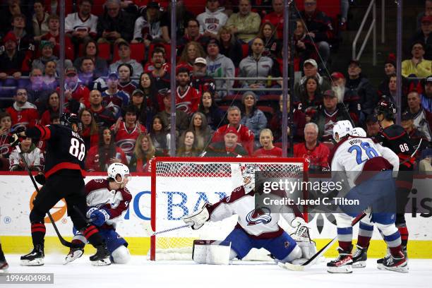 Martin Necas of the Carolina Hurricanes scores his hat trick goal during the first period of the game against the Colorado Avalanche at PNC Arena on...