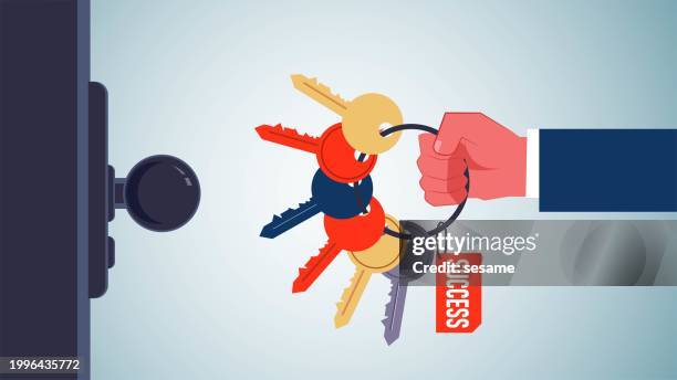 possessing the key to success or the secret to riches, multiple solutions to problems, unlocking the secret to success, the businessman's hand holding a set of keys to success to open doors - doorknob stock illustrations