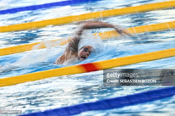Italy's Simona Quadarella competes in a heat of the women's 1500m freestyle swimming event during the 2024 World Aquatics Championships at Aspire...