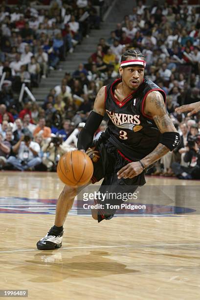 Allen Iverson of the Philadelphia 76ers dribbles against the Detroit Pistons in Game one of the Eastern Conference Semifinals during the 2003 NBA...
