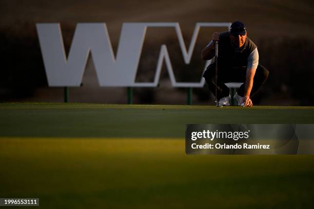 Kevin Stadler of the United States prepares to putt on the 12th green during the first round of the WM Phoenix Open at TPC Scottsdale on February 08,...