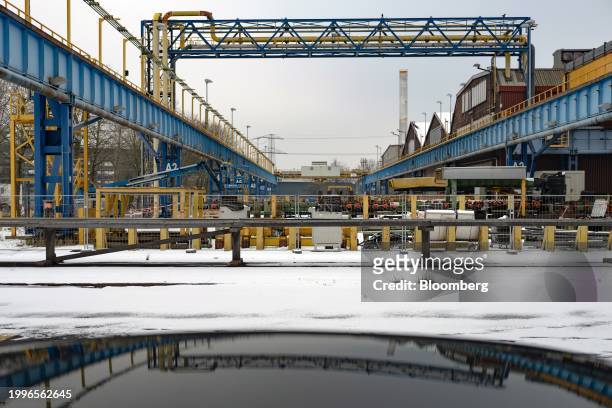 Production facilities and old equipment in a yard at the closed Vallourec SACA pipe plant in Düsseldorf, Germany, on Friday, Jan. 19, 2023. In some...