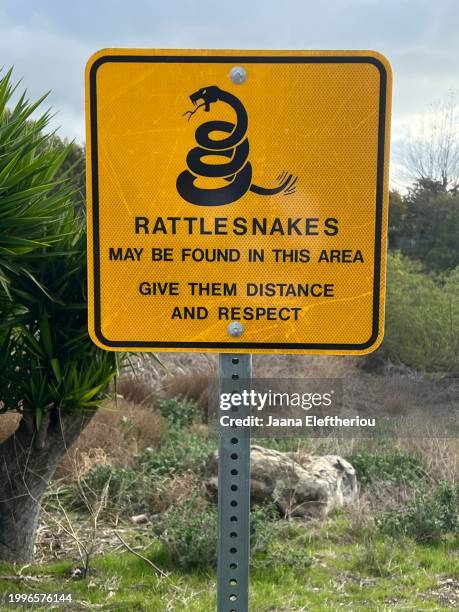 M R Snakes. Sign 100 Snake Warning Sign Stock Photos, High-Res Pictures, and Images ...