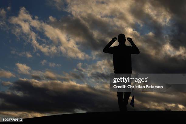 Andrew Putnam of the United States walks off the ninth green during the first round of the WM Phoenix Open at TPC Scottsdale on February 08, 2024 in...