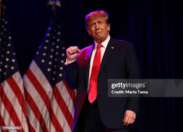 Republican presidential candidate and former U.S. President Donald Trump greets supporters at his caucus night watch party at the Treasure Island...