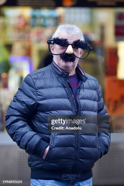 People take part in the Rosenmontag parade within the carnival season, also known as the 'Fifth Season', in Cologne, Germany on February 12, 2024....