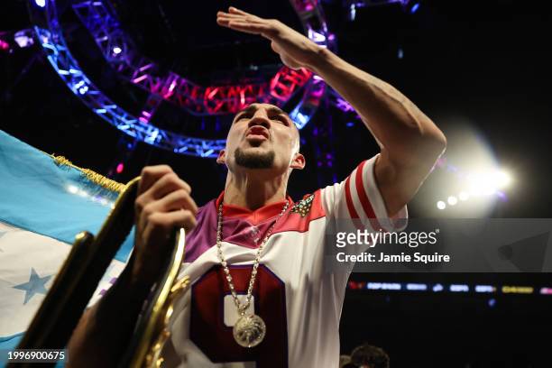 Teofimo Lopez celebrates defeating Jamaine Ortiz to retain the WBO junior welterweight title at Michelob ULTRA Arena on February 08, 2024 in Las...