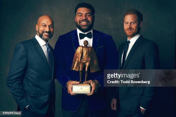 Cameron Heyward of the Pittsburgh Steelers poses for a portrait after winning the Walter Payton Man of the year with Keegan-Michael Key and Prince...