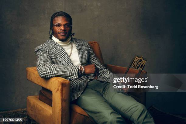 Lamar Jackson of the Baltimore Ravens poses for a portrait after winning MVP at the 13th Annual NFL Honors on February 8, 2024 in Las Vegas, Nevada.