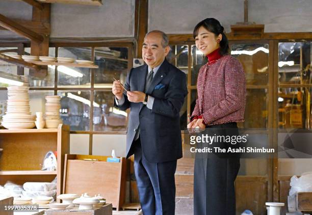 Princess Kako of Akishino listens to explanation from Imaizumi Imaemon XIV at Imaemon Kiln on February 8, 2024 in Arita, Saga, Japan.