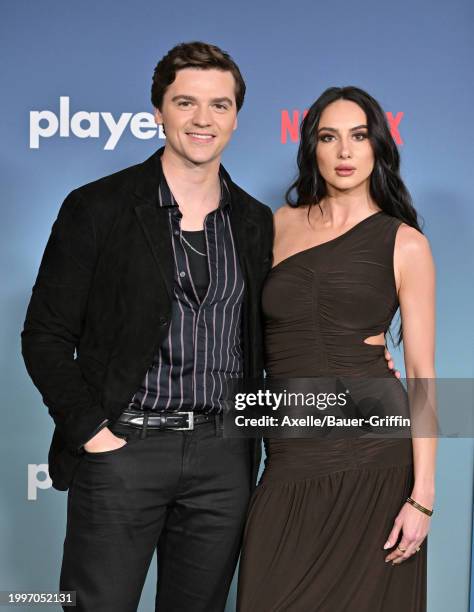 Joel Courtney and Mia Scholink attend the Photo Call for Netflix's "Players" at The Egyptian Theatre Hollywood on February 08, 2024 in Los Angeles,...