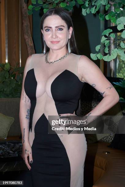 Celia Lora poses for a photo during a press conference to unveil Celia Lora as the cover star of 'Penthouse Magazine' at Terraza Panthera on February...