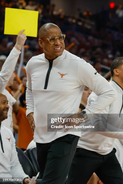 Texas Longhorns head coach Rodney Terry grimaces after a questionable call by the referee during the Big 12 college basketball game between Texas...