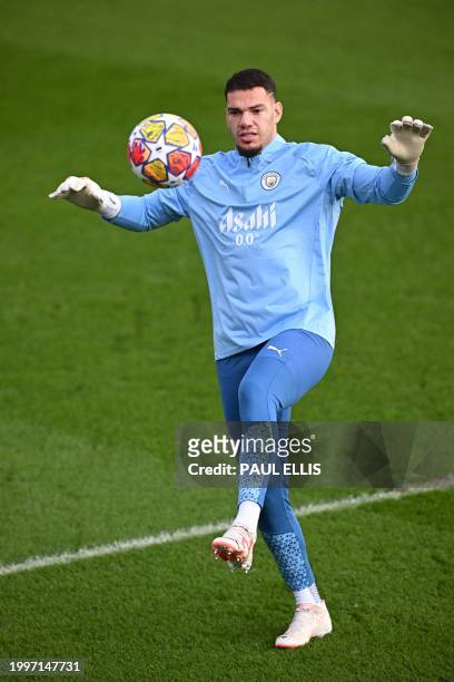 Manchester City's Brazilian goalkeeper Ederson attends a training session at Manchester City's training ground in north-west England on February 12...