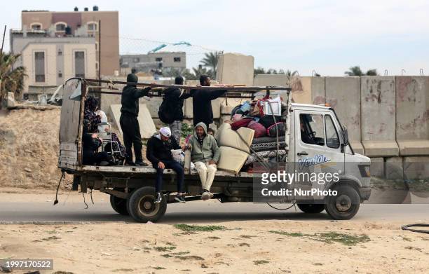 Palestinian families are fleeing Rafah on the southern Gaza Strip, taking the coastal road toward Deir Al-Balah in the central Gaza Strip, on...